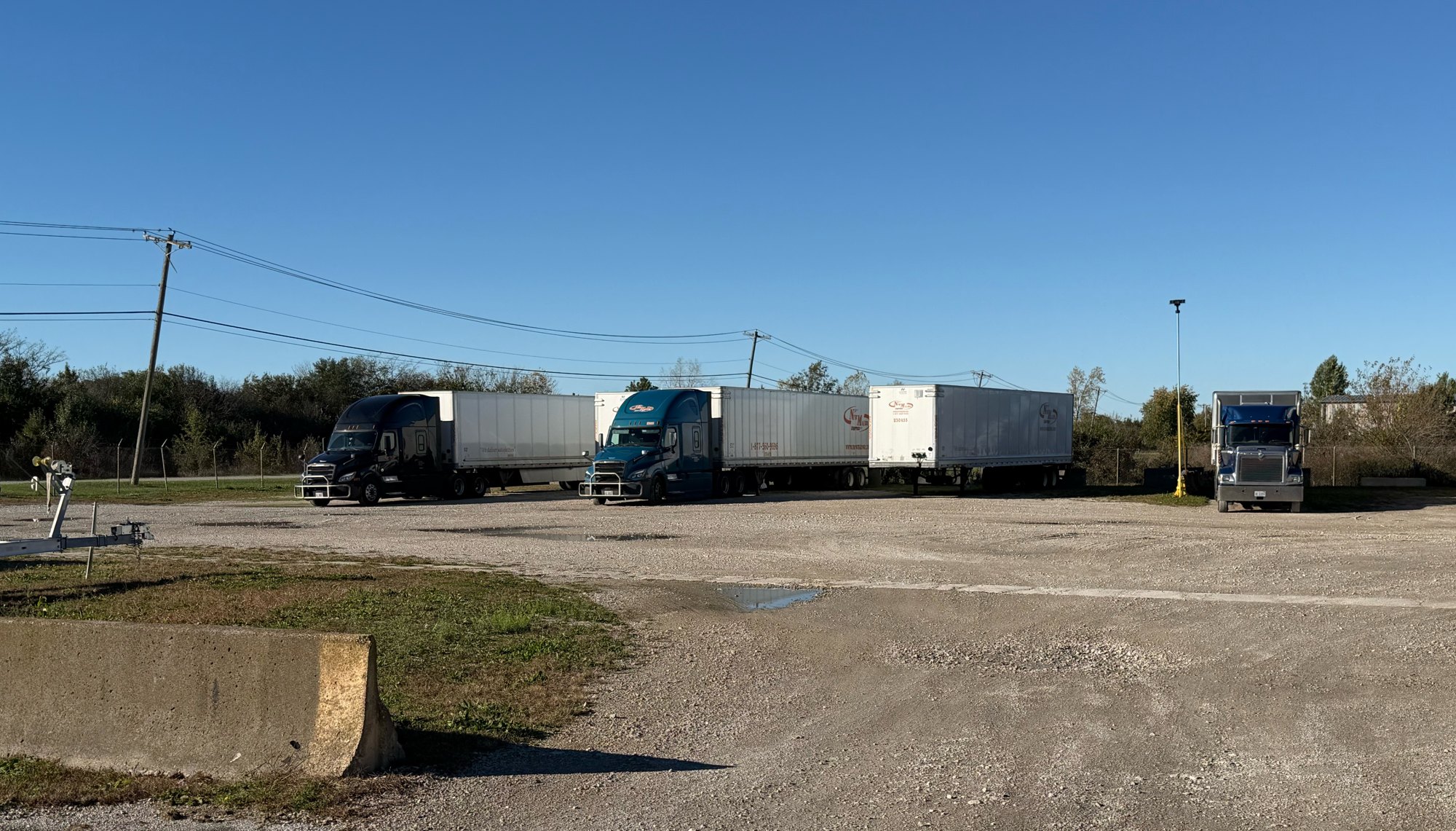 Semi-trucks and trailers parked in Thunderbird’s Lot B